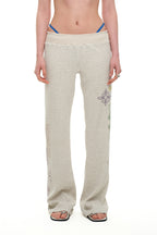 FOLK PATTERN SLIM-FIT WAFFLE PANTS (IVORY)