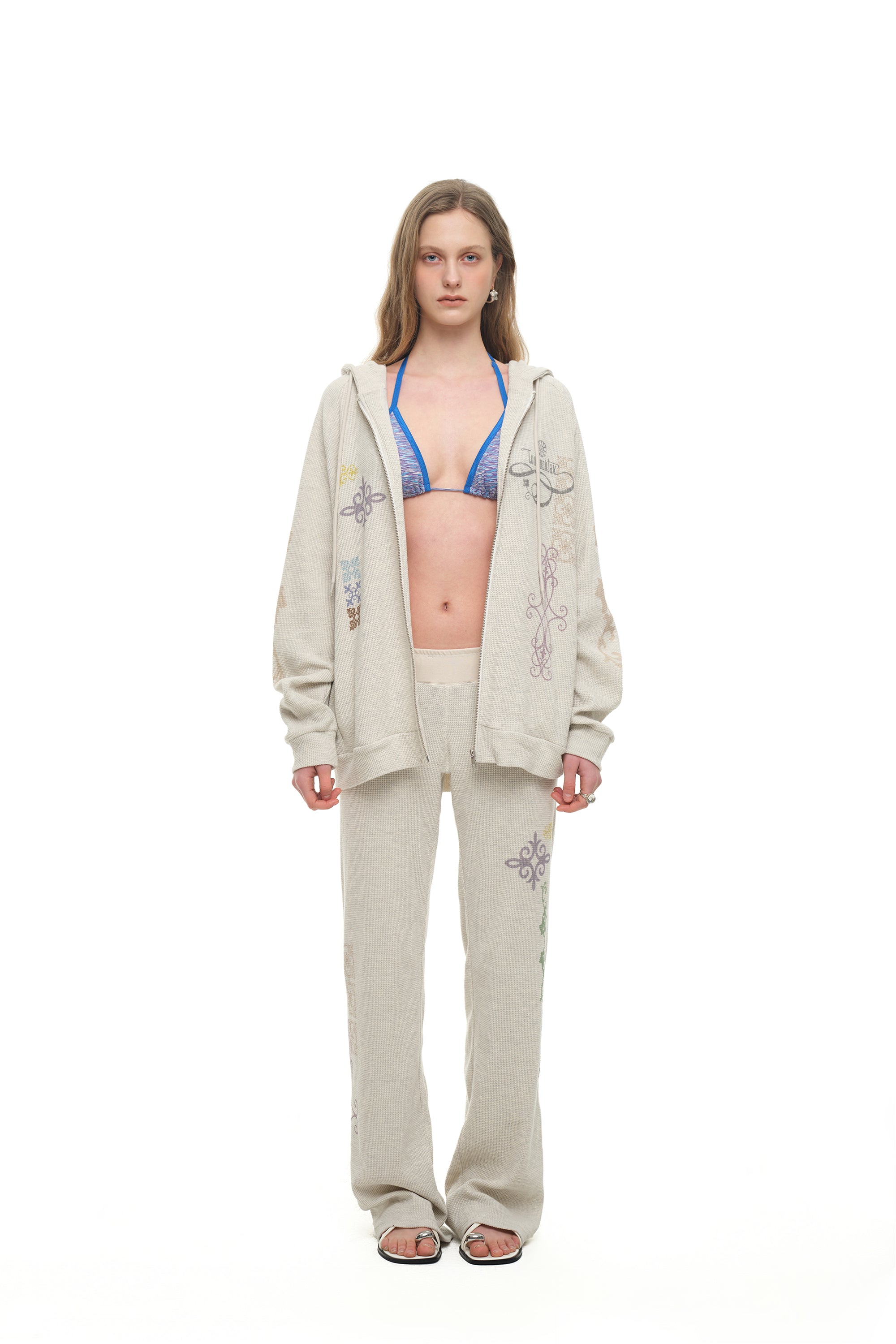 FOLK PATTERN SLIM-FIT WAFFLE PANTS (IVORY)
