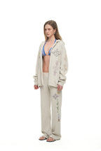 FOLK PATTERN SLIM-FIT WAFFLE PANTS (IVORY)