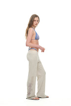 FOLK PATTERN SLIM-FIT WAFFLE PANTS (IVORY)